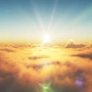 Acceuil 9 Lever de soleil audessus des nuages, symbole d’éveil spirituel et de transformation intérieure, illustrant l’accompagnement en neuroénergétique et ThetaHealing avec Nadège Augereau.